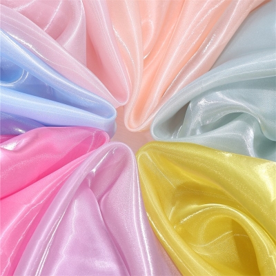 Transparent liquid metal organza